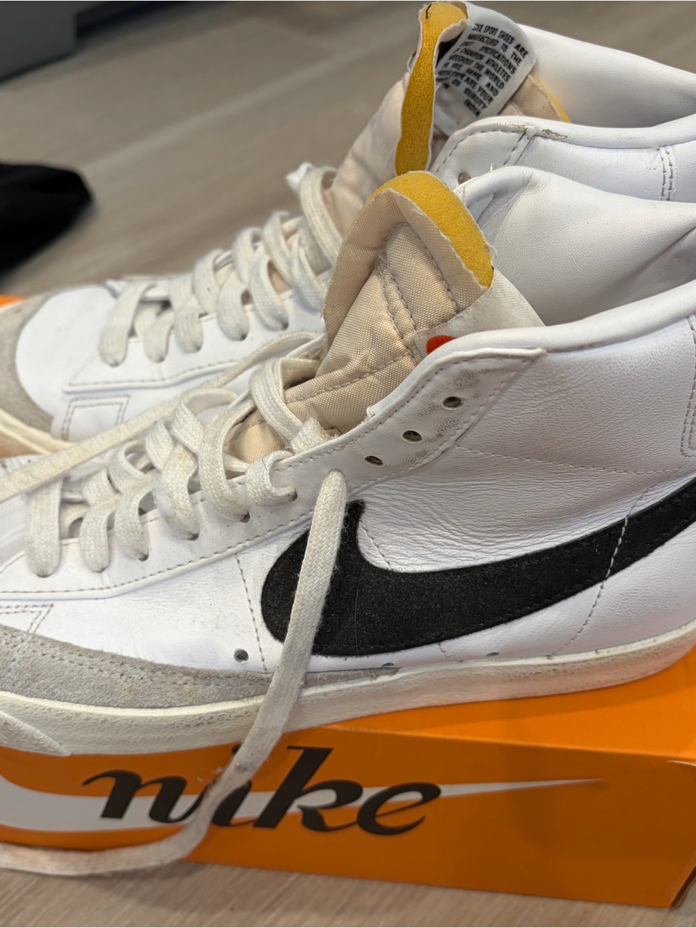 Nike women blazers White High-Top Sneakers with Black Swoosh and Yellow Tongue